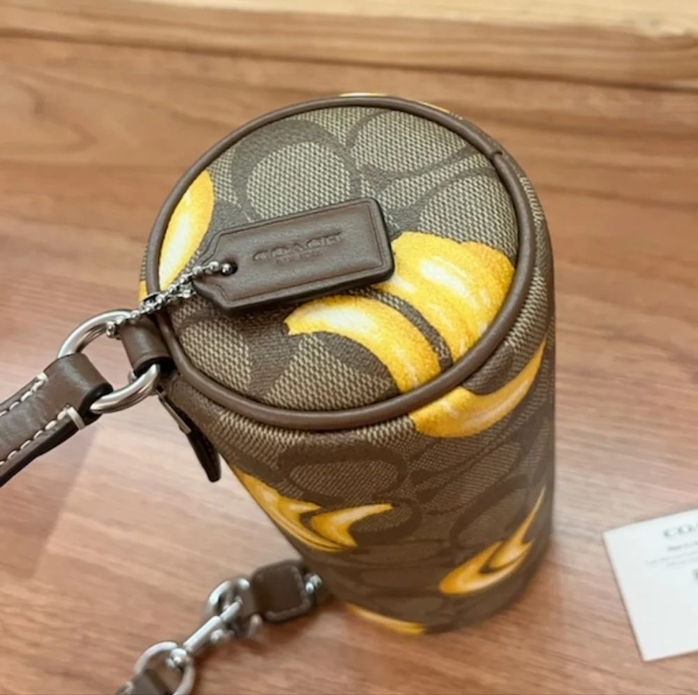 Coach Nolita Barrel Bag In Signature Canvas With Banana Print - Picture 5 of 14